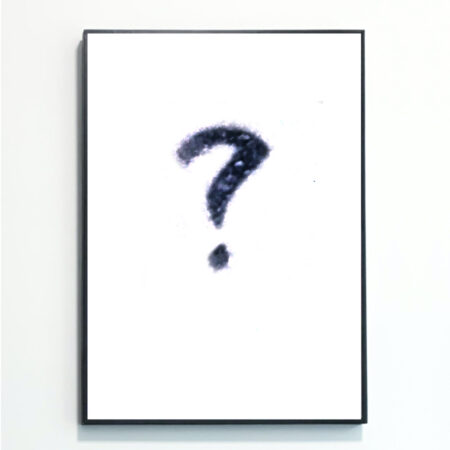 A Mystery Art print mounted on a wall, by Rebecca Taylor artist. The image depicts a framed white art print with a question mark, however the print you receive will be one chosen at random by artist Rebecca Taylor.