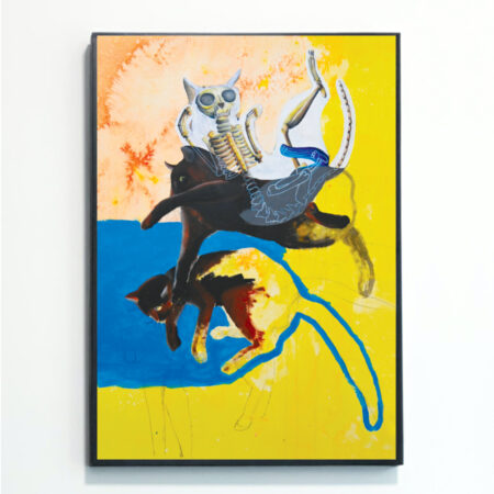 Abstract Jumping Cats was painted by artist Rebecca Taylor; it is mounted in a black frame against a white wall. It features three cats – one is a skeleton, one is fully painted, and one is partially painted. The background of the painting is yellow and orange with a wide wash of sky blue.